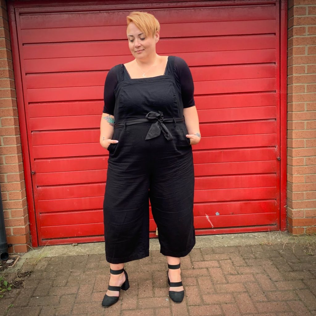 Plus Size woman in black outfit